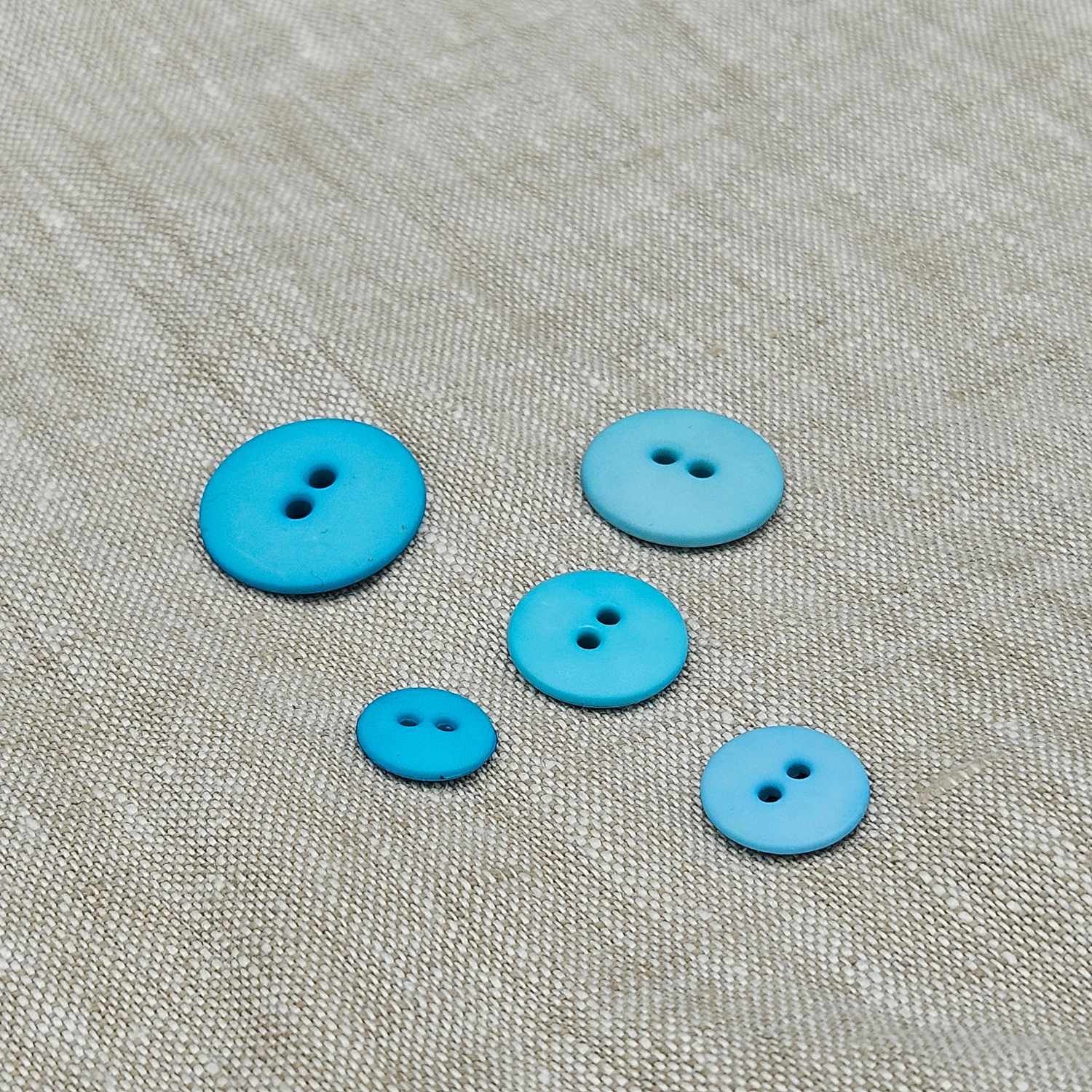 Plastknapp med 2 hål