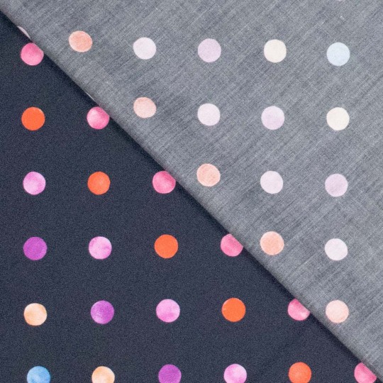 Färgglada prickar på mörk botten