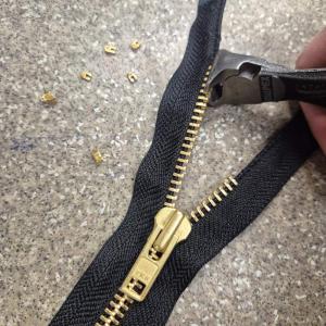 Justering av längd på dragkedja