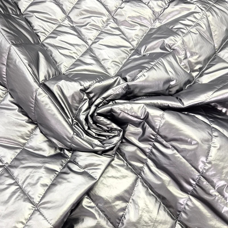 Quiltat tyg, blank yta – Silvergrå