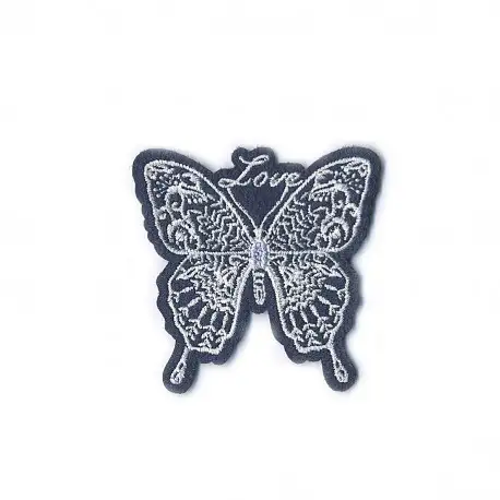 Tygmärke - Fjäril