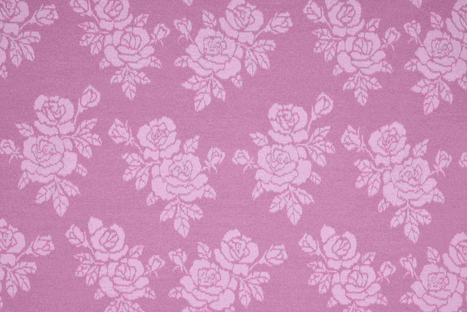 Rosa botten med svagt rosa blommor