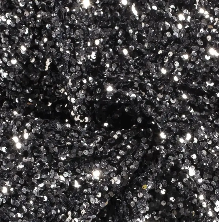 Paljettyg med sammetsbotten