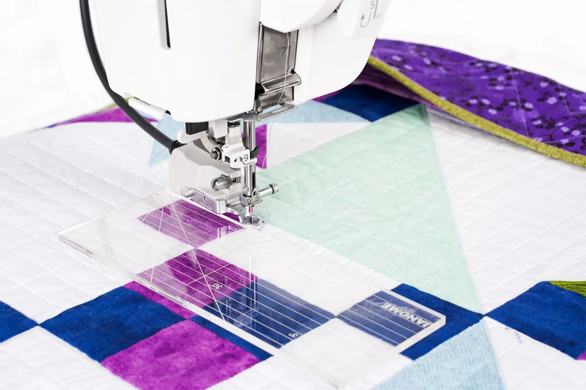 A.S.R. stygnregulator vid linjalquiltning på Janome Continental M8