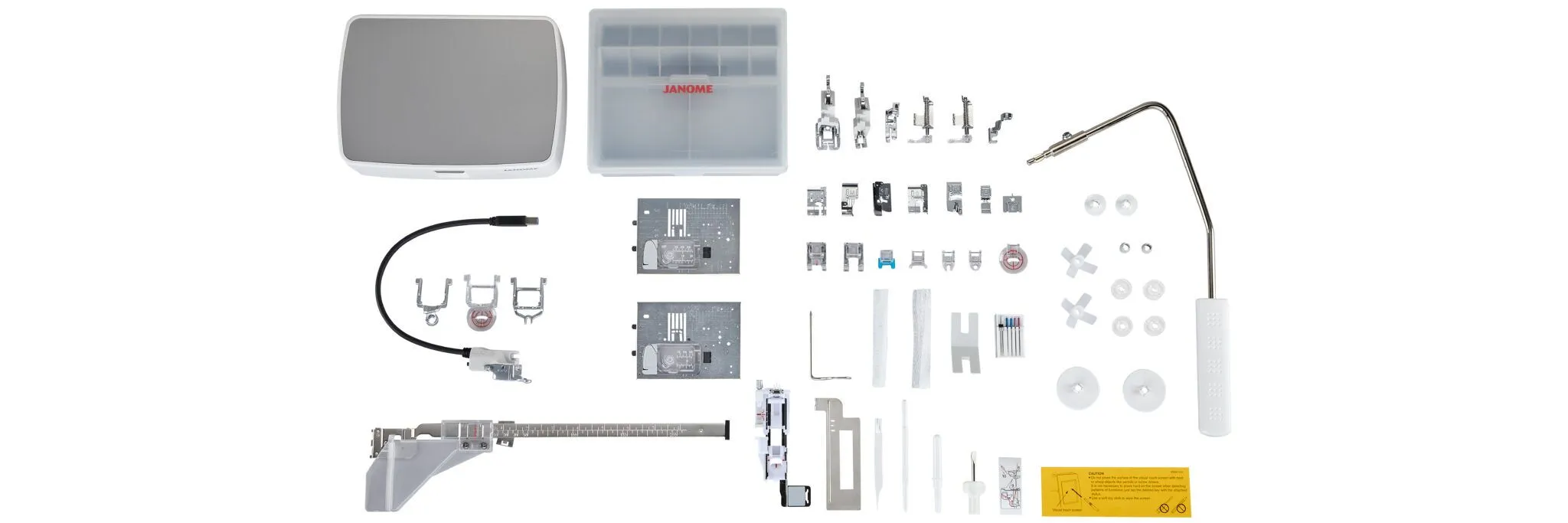 Alla medföljande pressarfötter och tillbehör till Janome Continental M8