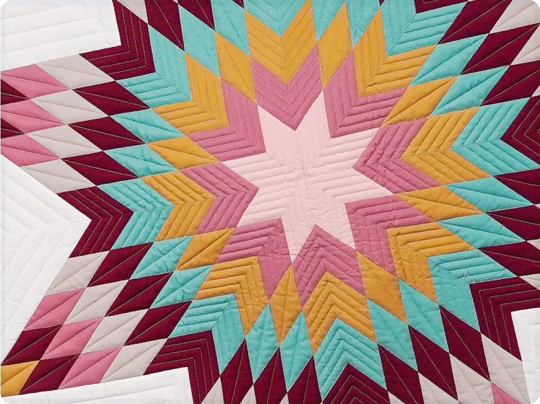 Quiltblock med exakt piecing sytt på Janome 9480QCP