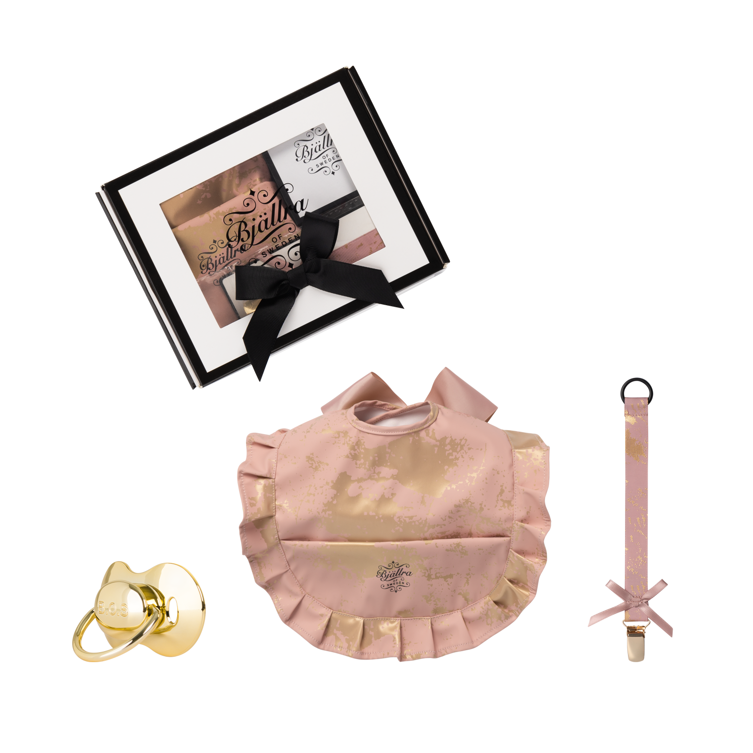 Presentlåda till till baby och nyfödd med rosa och guld haklapp, napp och napphållare från Bjällra of Sweden.