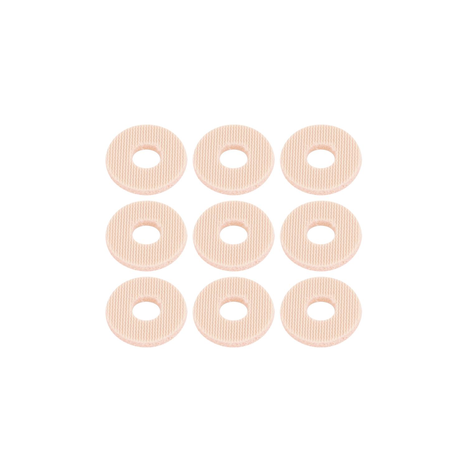 Små runda Latexfotskydd med centralt hål