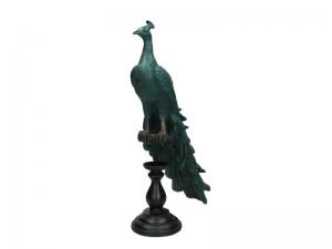 Påfågelskulptur på fot