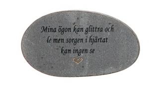 Grå sten med graverad text, Mina ögon kan glittra och le...