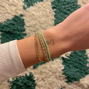 Armband Svart, koppar Indie, guldpläterat - Pilgrim