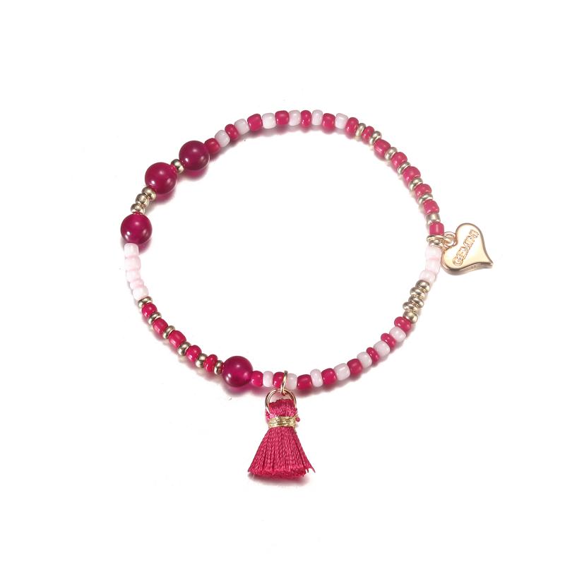 Elastiskt Armband med cerise och rosa pärlor med cerise tofs - Gemini