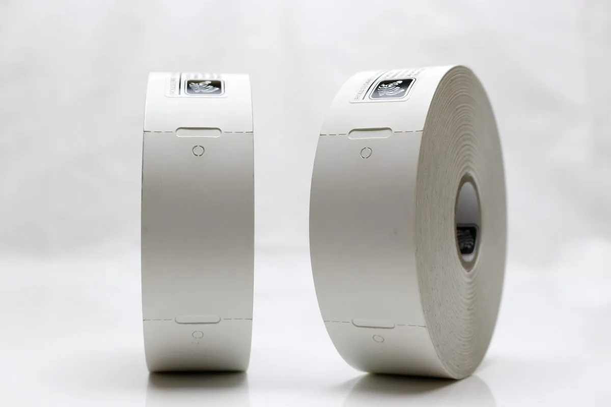 Etikettrulle, Häng-tag med hål, DT, Perf, 32x57Ø25,4 mm, 600 st/rulle