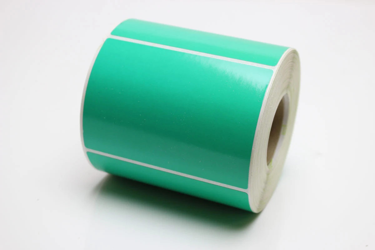 Däcketikett, Starkt specialklister, Grön, TT, Perforerad, 105x74Ø40 mm, 700 st/rulle