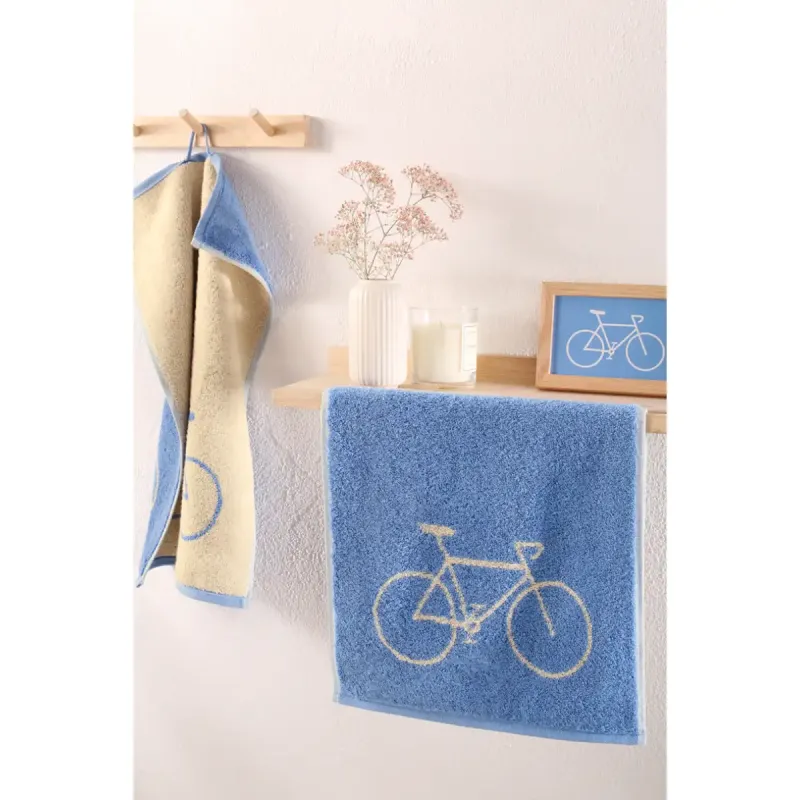 Cawö Postcard Towels guest towel with bicycle print – capri blue 100-21