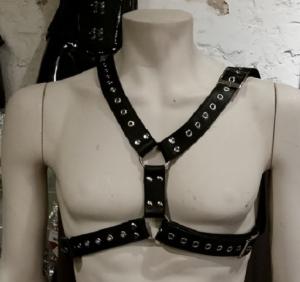 Black leather chest harness with eyelets