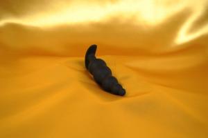 Anaalitulppa helmillä