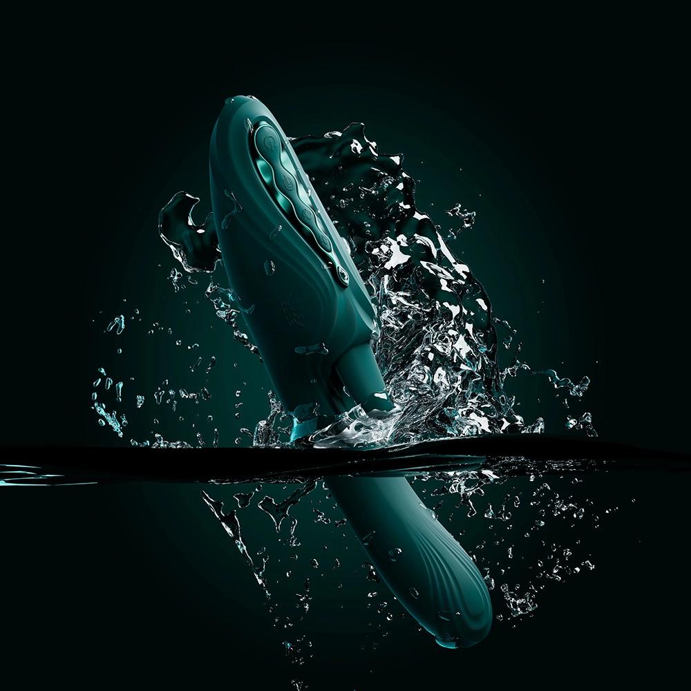 Vihreä ARES G-pisteen Rabbit-vibraattori upotettuna veteen – vedenkestävä muotoilu, vain Chambers of Lovelta.