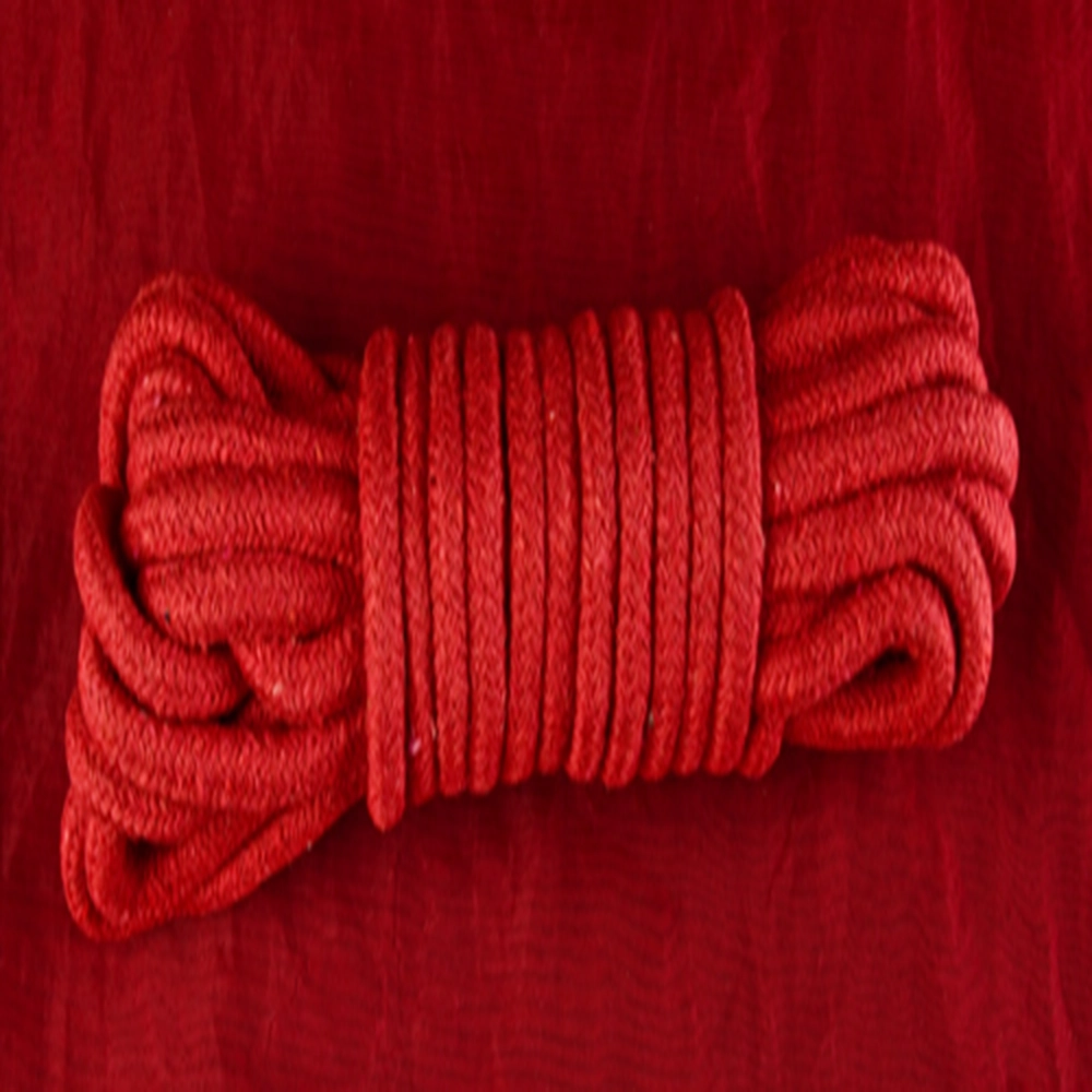 Bondage Köysi Punainen Puuvilla Chambers of Lovelta, 10 metriä pitkä ja 7 mm paksu. Standardivalinta turvalliseen ja tyylikkääseen bondageen.