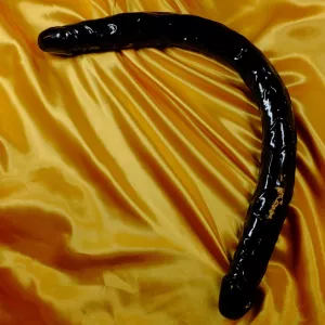 Black double ended dildo 71 x 4.8 cm – extra long curved design on gold satin background from Chambers of Love