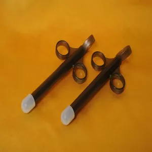 Chambers of Love’s black lube injector for safe, deep application of lubricant.