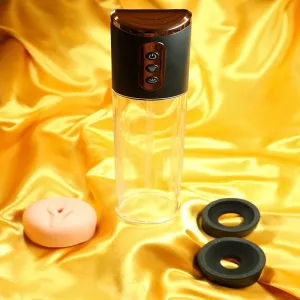 Automaattinen penispumppu realistisella vagina-holkilla – koko tuote näkyvissä, ohjauspaneeli ja sylinteri esillä, Chambers of Love.