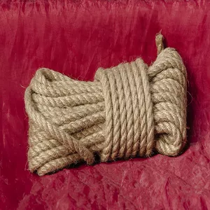 Natural hemp rope – traditional, rough, and durable rope made from natural hemp for authentic Shibari and advanced bondage from Chambers of Love.