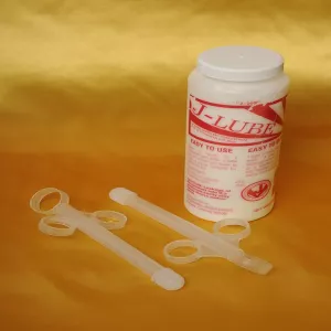 J-Lube powder lubricant jar with lube applicators – concentrated water-based lubricant you mix with water from Chambers of Love.