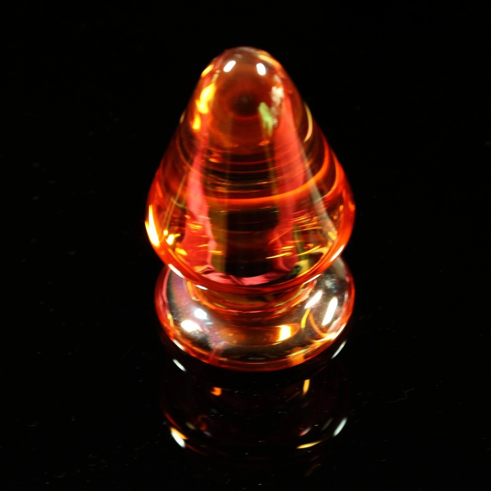 Konischer Glas-Analplug von Chambers of Love, von oben fotografiert. Elegantes Design für Genuss und Präzision.