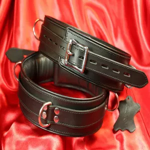 Musta pehmustettu BDSM-kahle mustalla reunalla Chambers of Lovelta. Ylellinen, mukava ja eksklusiivinen design premium-mallistostamme.