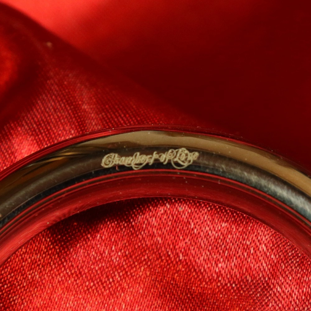 Kuva, joka näyttää Chambers of Loven laatuleiman – symboli eksklusiivisuudelle ja korkeimmalle laadulle tässä ainutlaatuisessa tuotteessa.