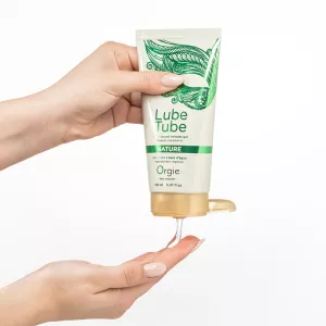 Hand letting Orgie Lube Tube Nature natural water based lubricant run over fingers from Chambers of Love.