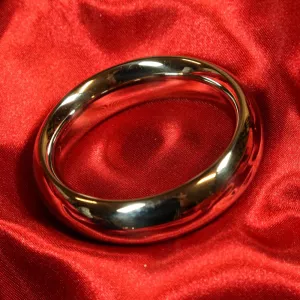 Donut metal penis ring 50 mm from Chambers of Love's exclusive collection – elegant and high-quality design for intense and extra powerful male orgasms.