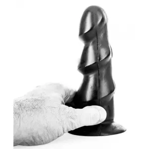 Anal plugg AB40 All Black Trippel Våg 15 cm svart PVC plug med regelbundna våg formationer längs skaftet, hållen i vit hand på vit bakgrund för att visa struktur och stabilitet