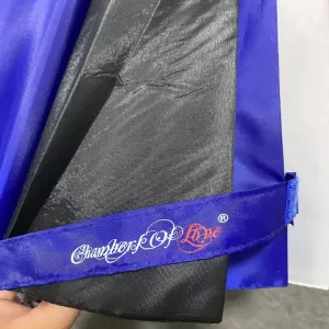 Close-up of Chambers of Love logo on Pride umbrella with blue, black, and white fetish flag – exclusive accessory symbolizing community in the fetish world.
