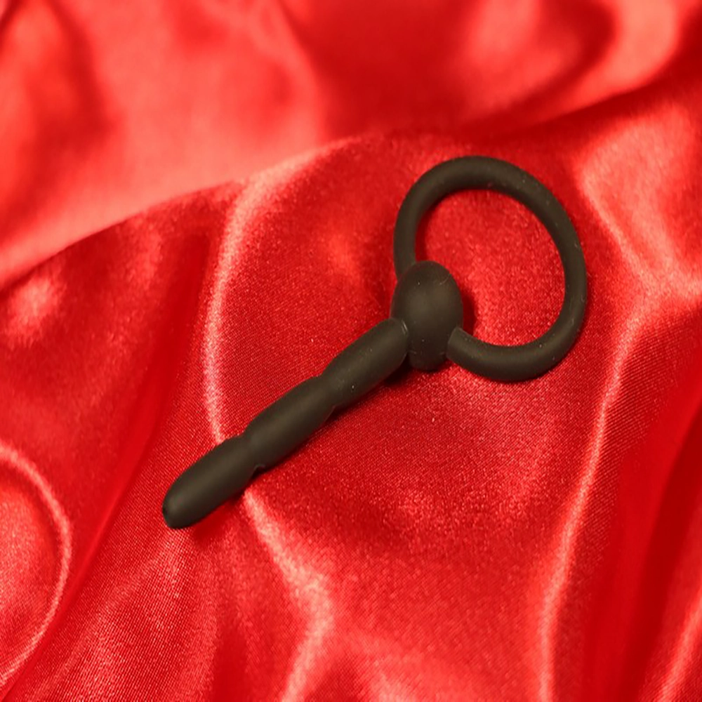 Ihålig ribbad silikondilator med ring från Chambers of Love. Innovativ design för intensiv och varierad njutning.