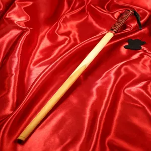 Cane baton in red and black from Chambers of Love – robust design, exclusive collection.