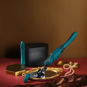 Turkoosinvihreä seksikone Zalolta, tyylikkäästi esitelty ylellisellä kultaisella tarjottimella. Eksklusiivinen tuote Chambers of Lovelta, joka yhdistää hienostuneisuuden ja nautinnon.