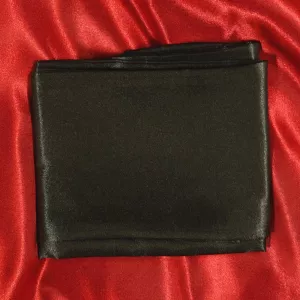 Black silk blindfold from Chambers of Love in soft silk fabric for total blackout, sensual play and soft bondage.