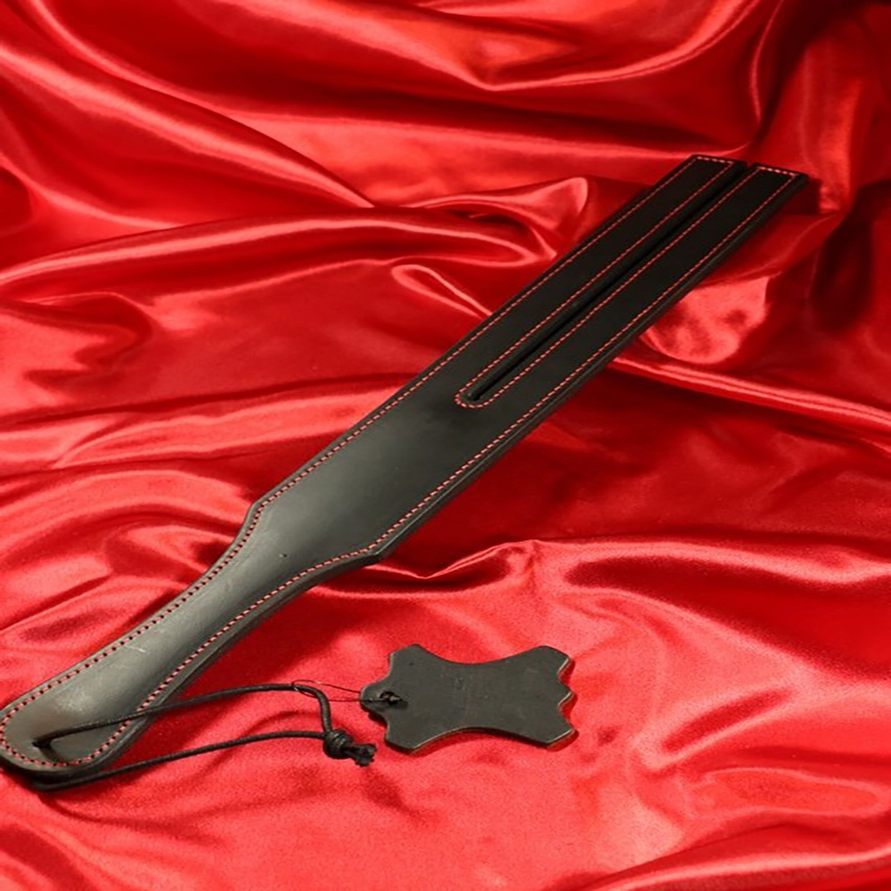 Narrow leather paddle tawse from Chambers of Love – exclusive black leather paddle with decorative red stitching, 47 cm long, for iconic discipline and stylish BDSM.