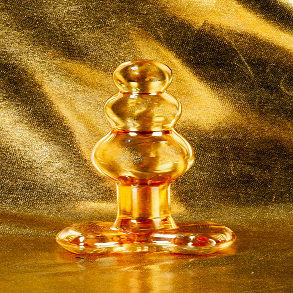 Three-bead glass anal plug from Chambers of Love, photographed directly from the front. Elegant and sleek design for pleasure and precision.