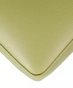 Trent stol från Global i lime grönt konstläder och närbild på sits.