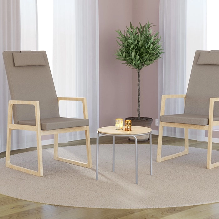 Saga fåtöljer med hög rygg och nackkudde från Inoff i en miljö.