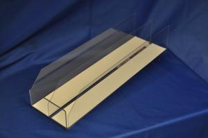 Lutande hylla med glidlist efter produktens form för ökad försäljning i hyllan 