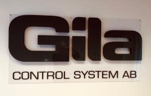 Skylt logo på plexi