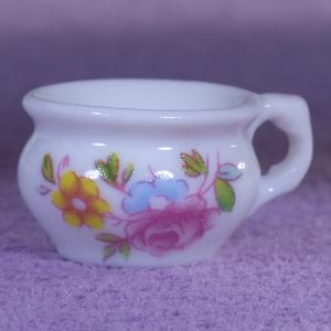 Potta i porslin med blommönster