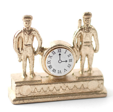 Klocka guld figurer mantelklocka bordsur
