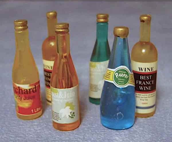 6 flaskor m diverse drycker