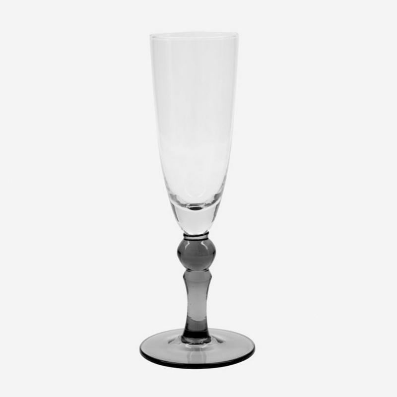 champagneglas med gråtonad fot