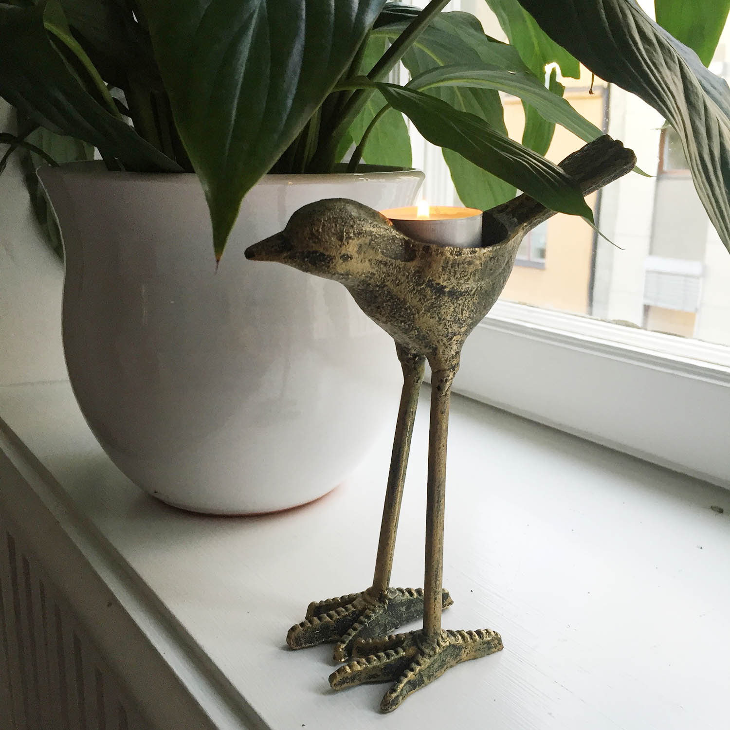 Fågel på långa ben som ljuslykta& dekoration Fågel på långa ben som ljuslykta& dekoration